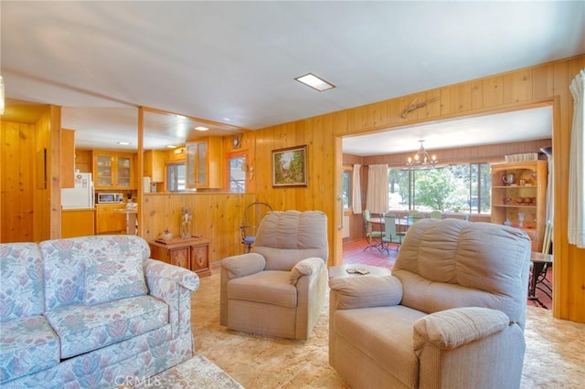 960 Snowbird Rd, Wrightwood, CA 92397 - living room with wooden walls and a chandelier