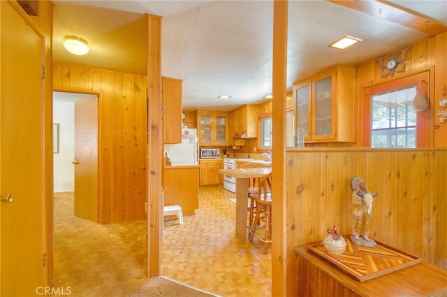 960 Snowbird Rd, Wrightwood, CA 92397 - corridor featuring wooden walls and light floors