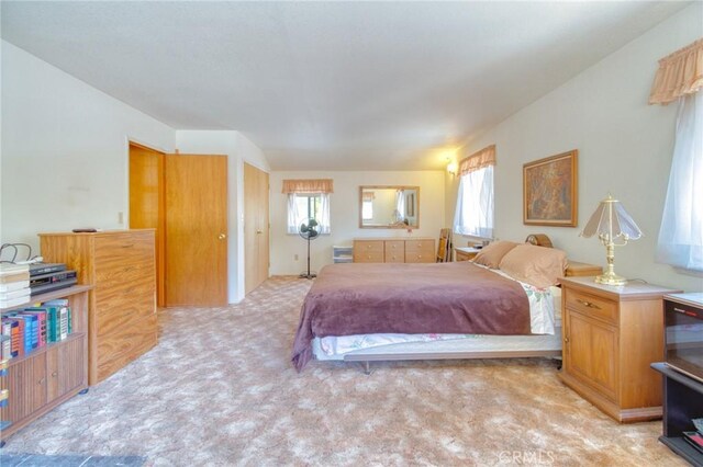 960 Snowbird Rd, Wrightwood, CA 92397 - bedroom with multiple windows and light carpet
