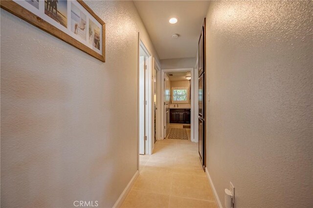 3486 Cascade Creek Ave, Merced, CA 95340 - hall with a textured wall and recessed lighting