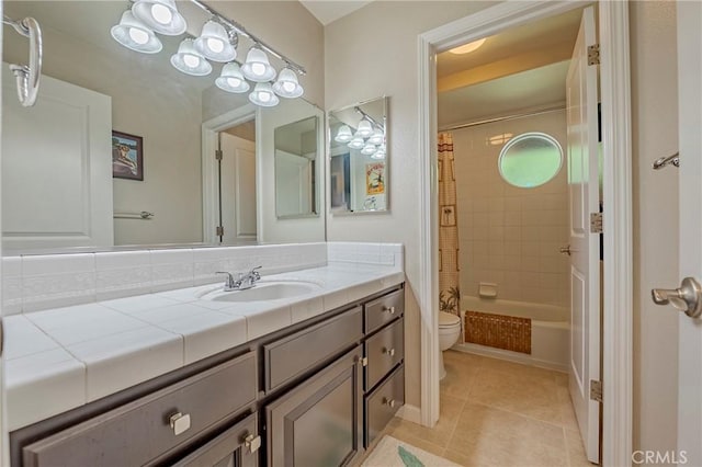 3486 Cascade Creek Ave, Merced, CA 95340 - bathroom featuring vanity, tile patterned flooring, and shower / tub combo with curtain