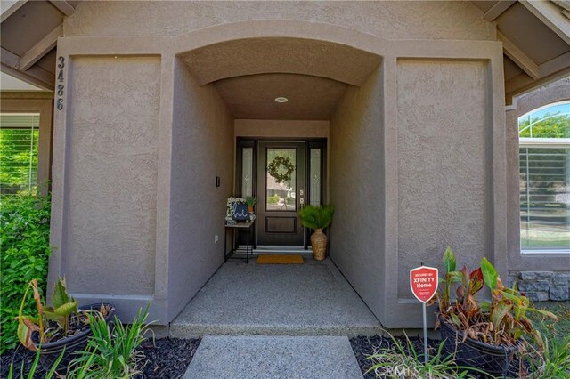 3486 Cascade Creek Ave, Merced, CA 95340 - view of exterior entry featuring stucco siding
