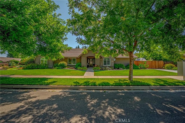 3486 Cascade Creek Ave, Merced, CA 95340 - view of front of home featuring stucco siding