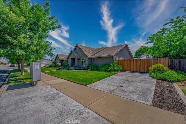 3486 Cascade Creek Ave, Merced, CA 95340 - view of front of home featuring a tiled roof and stucco siding