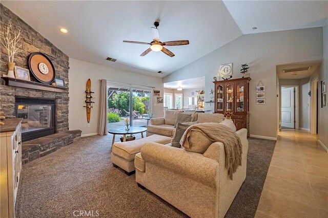 3486 Cascade Creek Ave, Merced, CA 95340 - living area featuring carpet, lofted ceiling, ceiling fan, and a stone fireplace