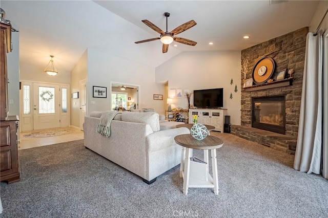 3486 Cascade Creek Ave, Merced, CA 95340 - living room featuring a ceiling fan, carpet, a fireplace, lofted ceiling, and recessed lighting