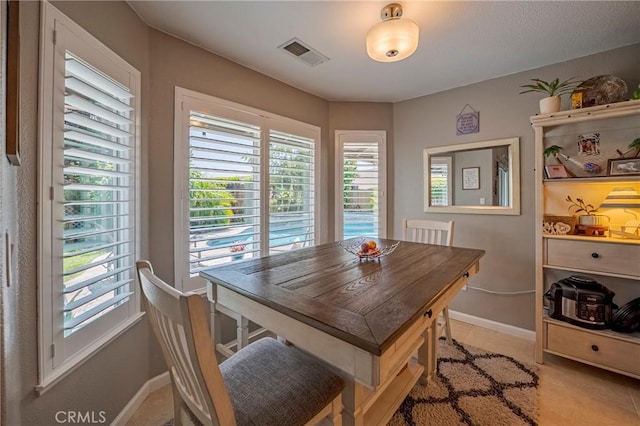 3486 Cascade Creek Ave, Merced, CA 95340 - dining room featuring baseboards