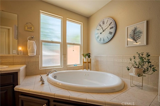 3486 Cascade Creek Ave, Merced, CA 95340 - full bath with healthy amount of natural light, vanity, and a bath