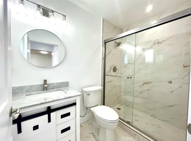 624 W 38th St, San Pedro, CA 90731 - bathroom featuring marble finish floors, vanity, and a marble finish shower