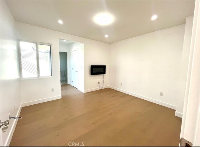 624 W 38th St, San Pedro, CA 90731 - unfurnished living room featuring dark wood-style floors and recessed lighting