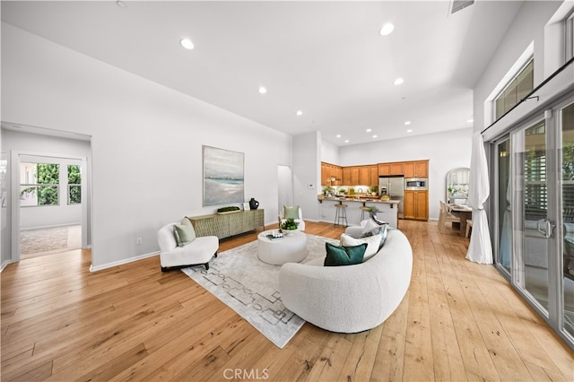 83 City Stroll, Irvine, CA 92620 - living area with recessed lighting and light wood-type flooring