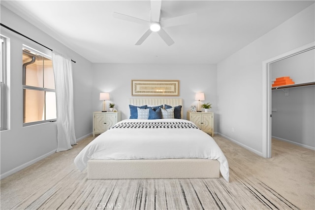 83 City Stroll, Irvine, CA 92620 - bedroom with light carpet, a walk in closet, and a ceiling fan