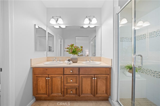 83 City Stroll, Irvine, CA 92620 - bathroom featuring double vanity, a shower stall, and tile patterned floors