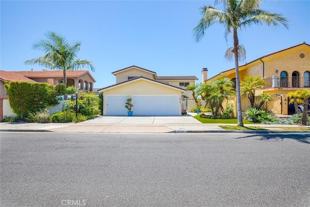 16781 Edgewater Ln, Huntington Beach, CA 92649 - view of front of house with driveway and an attached garage