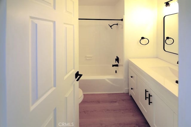 14163 Wimbleton Dr, Victorville, CA 92395 - bathroom with vanity, wood finished floors, and  shower combination