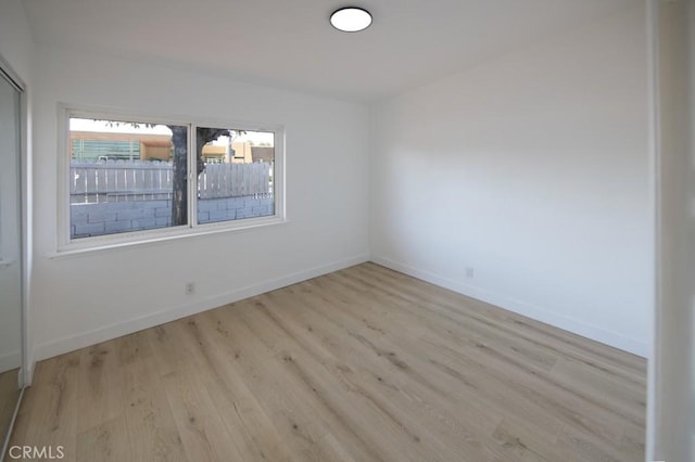 14163 Wimbleton Dr, Victorville, CA 92395 - spare room with wood finished floors and baseboards