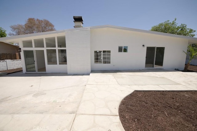 14163 Wimbleton Dr, Victorville, CA 92395 - back of house featuring a patio