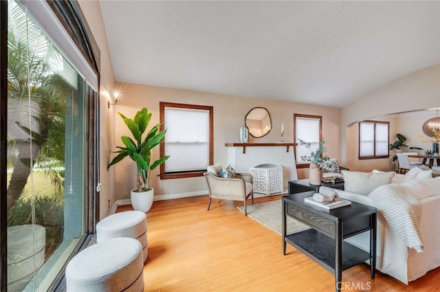 5855 Lemon Ave, Long Beach, CA 90805 - living area with light wood finished floors and lofted ceiling