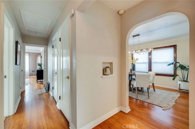 5855 Lemon Ave, Long Beach, CA 90805 - corridor with light wood-type flooring and arched walkways