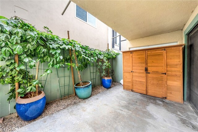 4647 Pico St Unit 101, San Diego, CA 92109 - doorway to property featuring stucco siding and a patio area