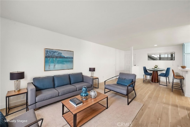 4647 Pico St Unit 101, San Diego, CA 92109 - living area with light wood-style floors and baseboards