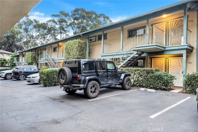 4647 Pico St Unit 101, San Diego, CA 92109 - uncovered parking lot with stairs