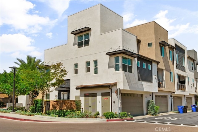 10554 Cannon Dr, Rancho Cucamonga, CA 91730 - view of building exterior featuring a garage