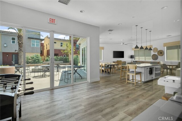 10554 Cannon Dr, Rancho Cucamonga, CA 91730 - living room with light wood-style flooring, a ceiling fan, and recessed lighting