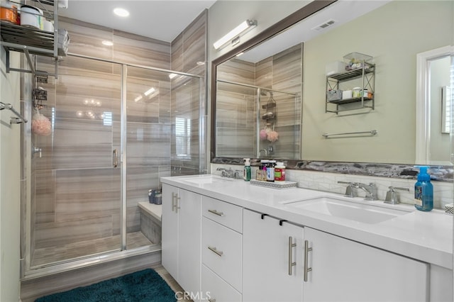 10554 Cannon Dr, Rancho Cucamonga, CA 91730 - full bathroom featuring double vanity, a shower stall, and recessed lighting