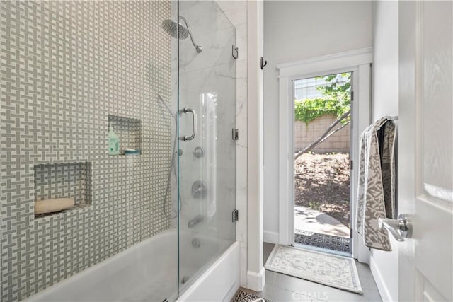 949 Moody Pl, Claremont, CA 91711 - bathroom featuring shower / bath combination with glass door and tile patterned floors