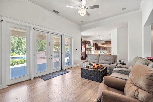 949 Moody Pl, Claremont, CA 91711 - living area featuring french doors, light wood-style floors, crown molding, and ceiling fan