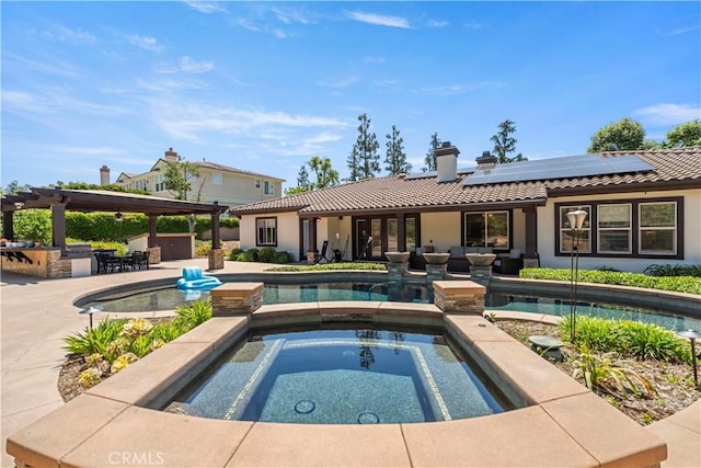 949 Moody Pl, Claremont, CA 91711 - outdoor pool with an in-ground hot tub, an outdoor kitchen, a patio area, and outdoor lounge area