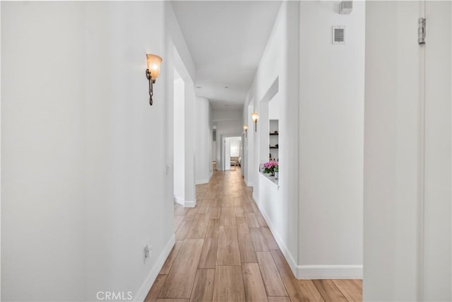949 Moody Pl, Claremont, CA 91711 - hall with light wood-style flooring and baseboards