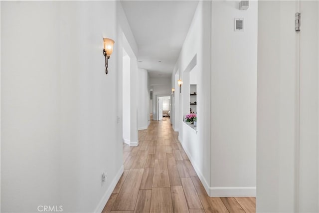 949 Moody Pl, Claremont, CA 91711 - hall with light wood-type flooring and baseboards