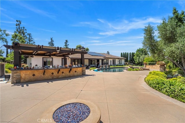 949 Moody Pl, Claremont, CA 91711 - rear view of property with an outdoor pool, a patio, and stucco siding