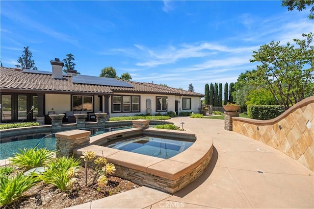 949 Moody Pl, Claremont, CA 91711 - swimming pool with an in-ground hot tub and a patio area