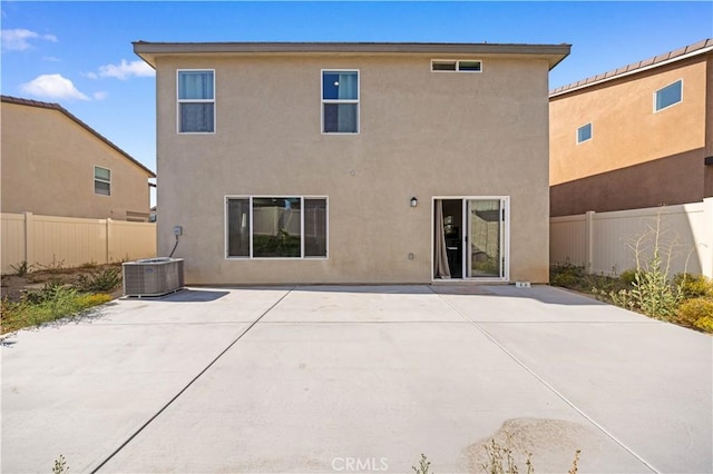 20225 Breeze Blooms Dr, Riverside, CA 92507 - rear view of property with stucco siding and a patio