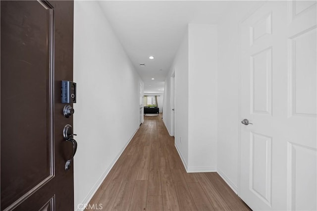 20225 Breeze Blooms Dr, Riverside, CA 92507 - hallway featuring wood finished floors and recessed lighting