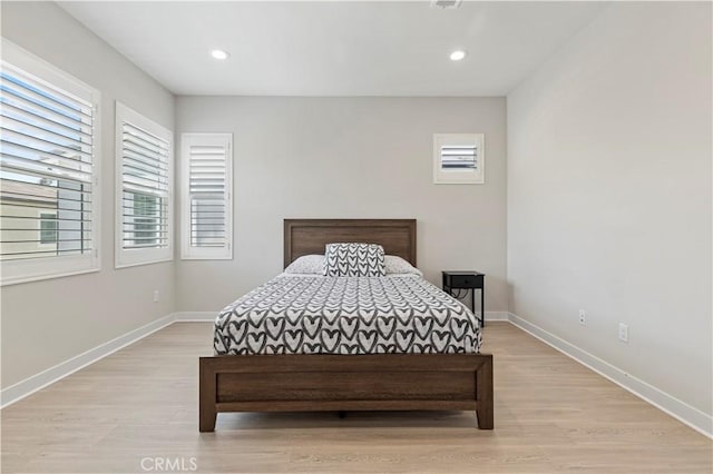 120 Holliston, Lake Forest, CA 92630 - bedroom with light wood finished floors and recessed lighting