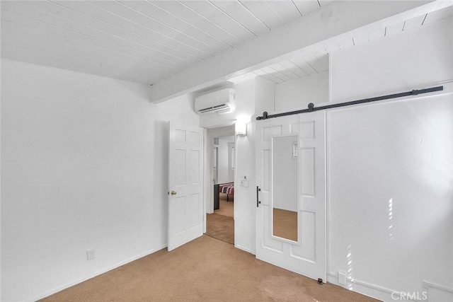 17109 E Orkney St, Azusa, CA 91702 - unfurnished bedroom with carpet floors, a wall mounted AC, a barn door, and a wood ceiling with exposed beams