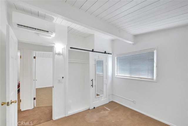 17109 E Orkney St, Azusa, CA 91702 - unfurnished bedroom featuring a wall mounted air conditioner, carpet floors, a wood ceiling with exposed beams, a barn door, and a closet