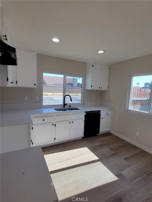 955 Mill Iron Way, San Jacinto, CA 92583 - kitchen featuring dishwasher, range hood, white cabinets, light countertops, and recessed lighting