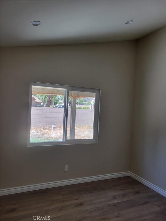 955 Mill Iron Way, San Jacinto, CA 92583 - spare room featuring dark wood-style flooring and recessed lighting