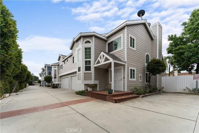 2547 Orange Ave Unit D, Costa Mesa, CA 92627 - view of front of house with concrete driveway and an attached garage