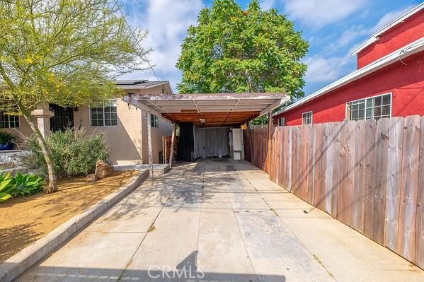 1186 Buelah Ave, City Terrace, CA 90063 - view of parking featuring a carport and concrete driveway