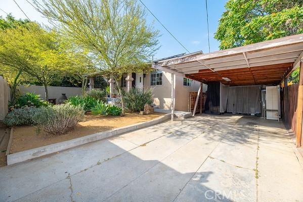 1186 Buelah Ave, City Terrace, CA 90063 - view of patio with a detached carport and concrete driveway