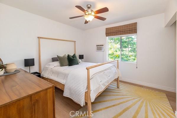1186 Buelah Ave, City Terrace, CA 90063 - bedroom featuring a wall mounted air conditioner and a ceiling fan