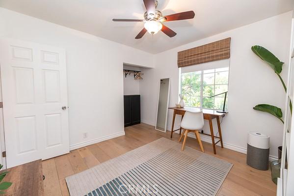 1186 Buelah Ave, City Terrace, CA 90063 - home office with wood finished floors and ceiling fan