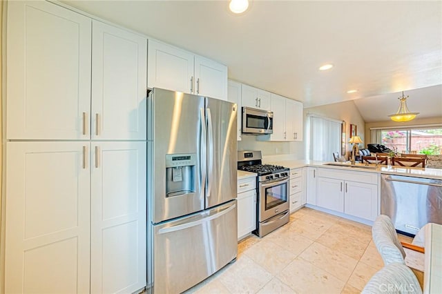 25312 Cassandra Ct, Mission Viejo, CA 92691 - kitchen featuring appliances with stainless steel finishes, white cabinetry, recessed lighting, light countertops, and light tile patterned flooring