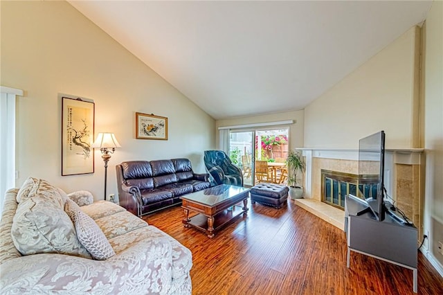 25312 Cassandra Ct, Mission Viejo, CA 92691 - living room featuring wood finished floors, a tile fireplace, and high vaulted ceiling